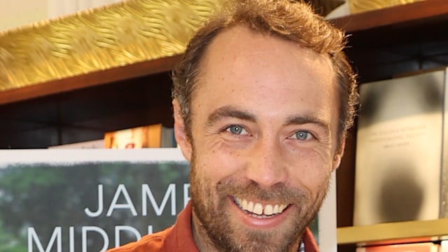 James Middleton smiling in a corduroy shirt