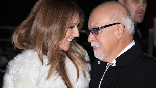 Celine Dion smiling at her husband Rene in a fluffy jacket