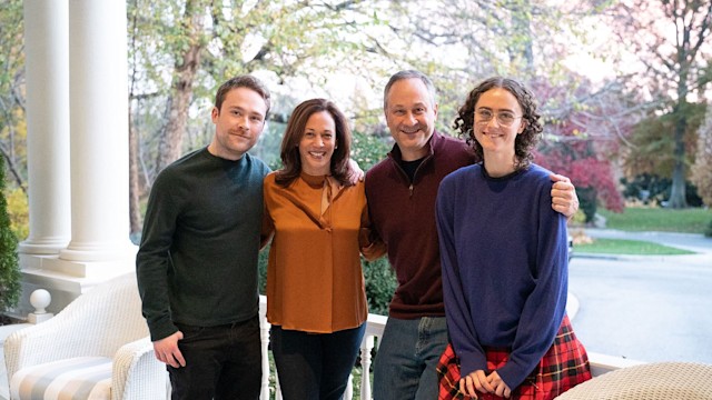 Cole Emhoff, Kamala Harris, Doug Emhoff and Ella Emhoff pose together on a balcony