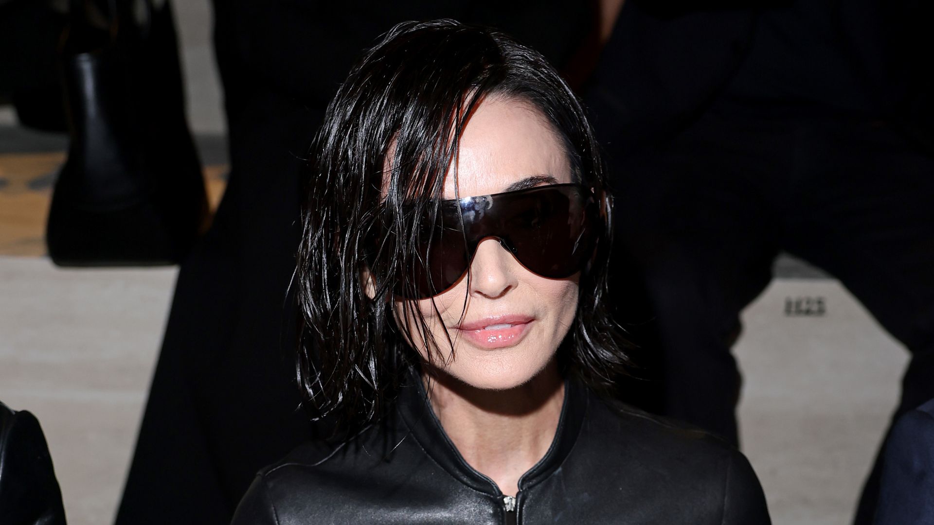 Demi Moore in leather look at the Gucci FW26 Fashion Show