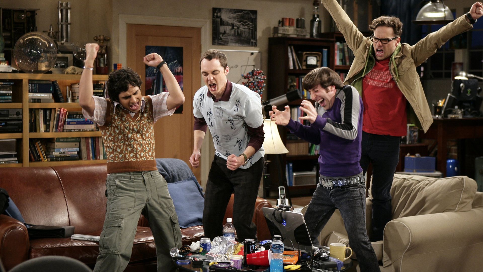 Leonard, Howard, Sheldon and Raj cheering during The Big Bang Theory 