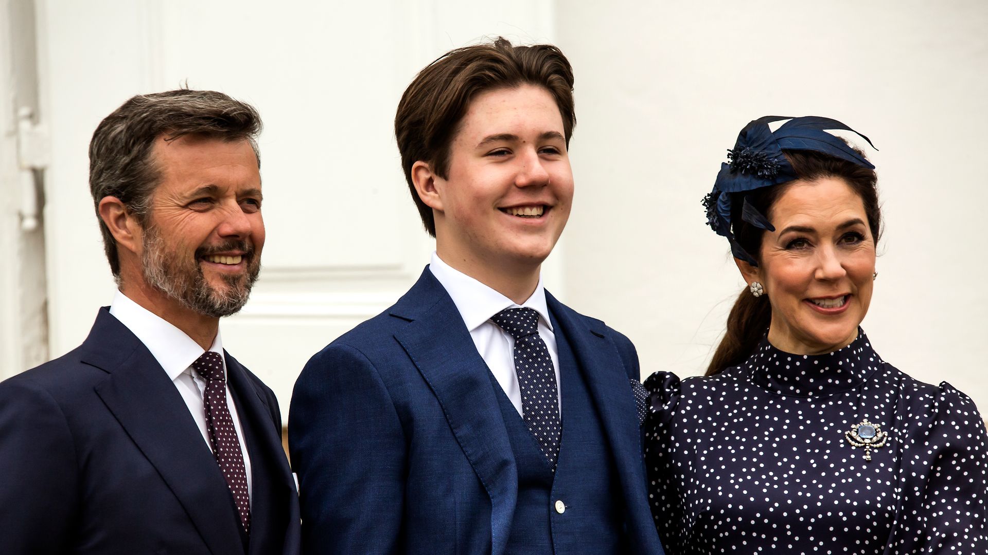 Frederik, Christian and Mary smiling at confirmation
