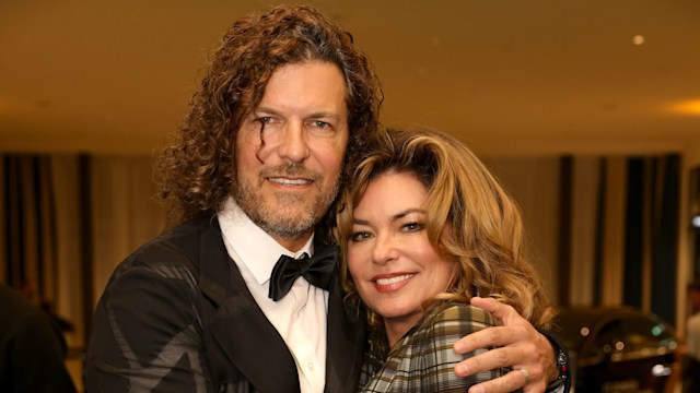 Frederic Thiebaud and Shania Twain embracing