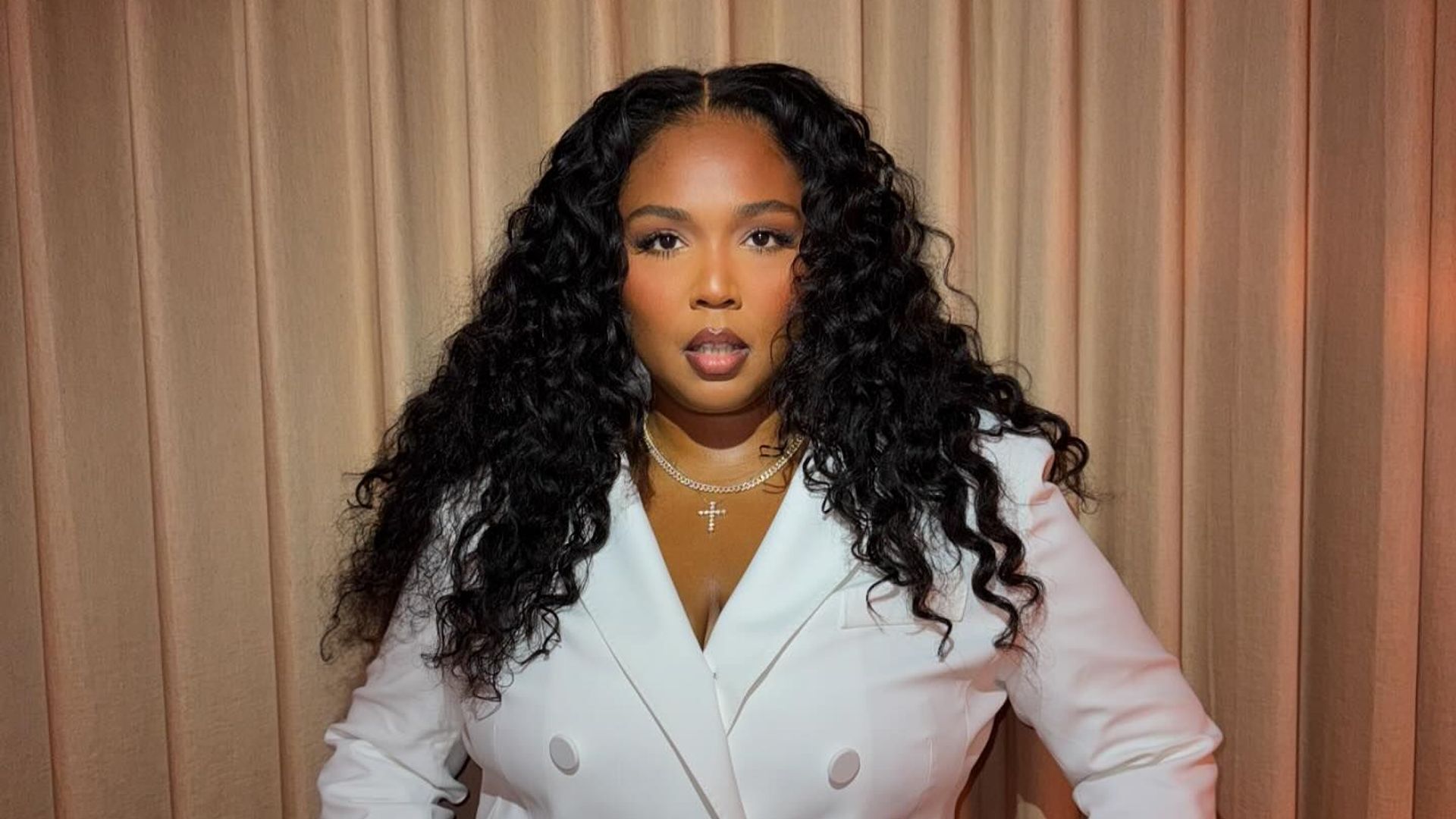 Lizzo highlights her curves in stunning bikini-clad photos during tropical vacation