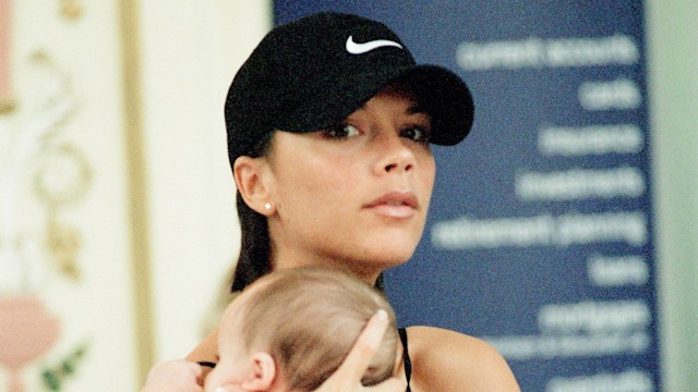 Victoria Beckham and baby son, Brooklyn Beckham, pictured out during shopping trip, The Trafford Centre, Manchester, 27th September 1999. 