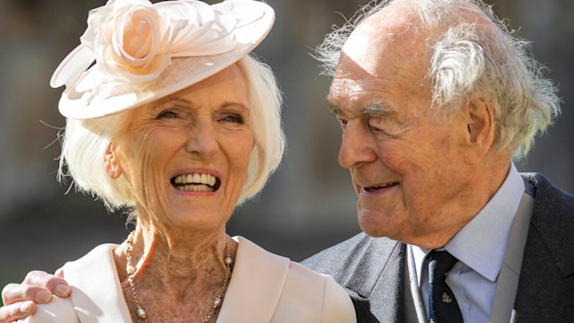 Mary Berry smiling outside Windsor Castle with her husband Paul Hunnings