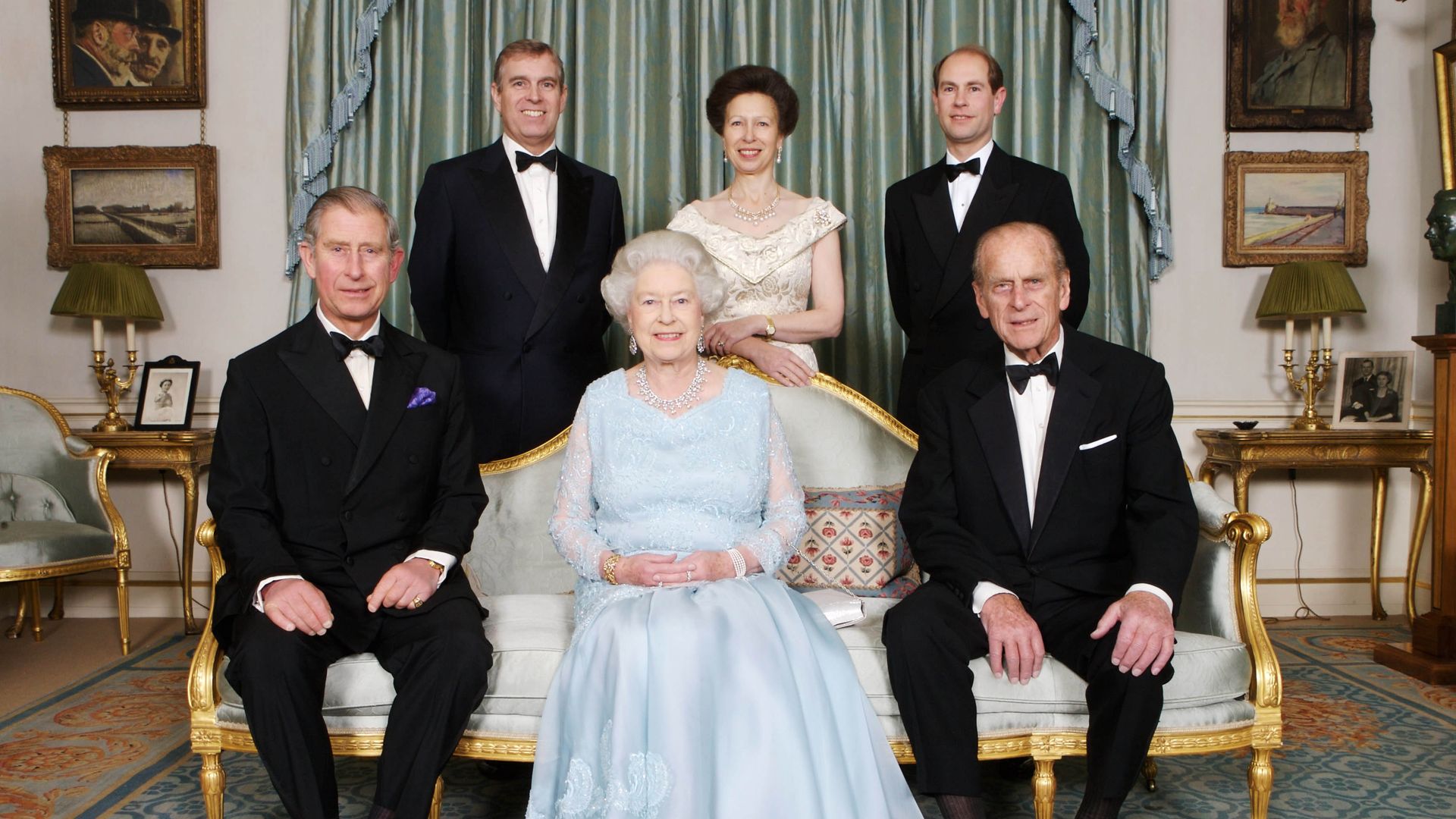 The Queen sat with Prince Charles and Prince Philip. Behind them are Prince Andrew, Princess Anne and Prince Edward