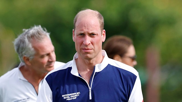Prince William walking in polo clothes