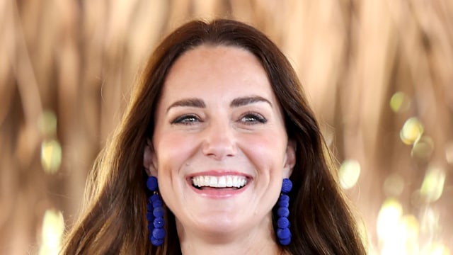 Catherine smiling in blue floral dress