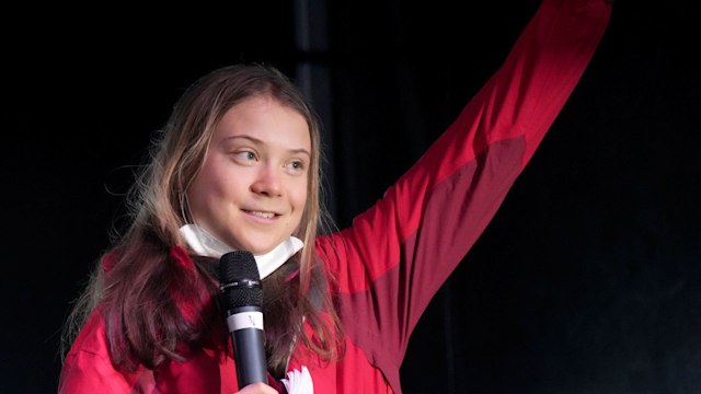 Greta Thunberg in red jumper
