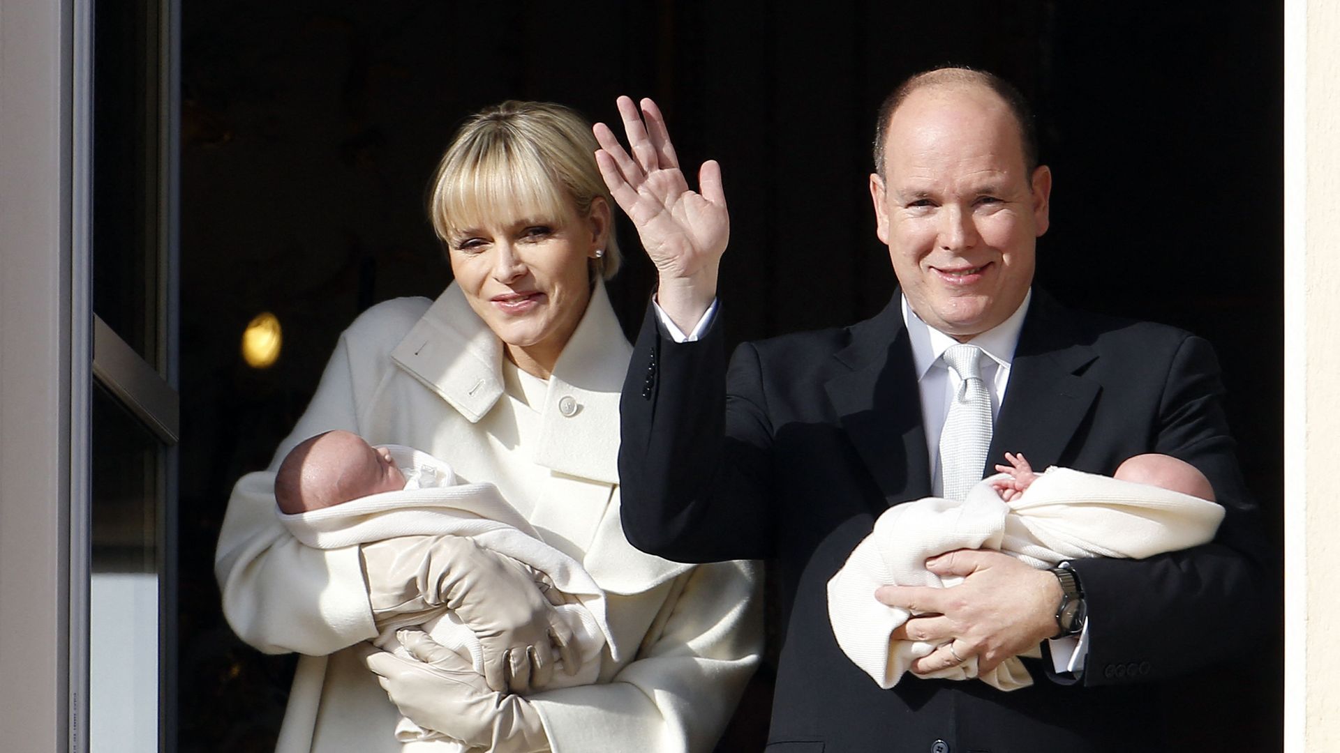 parents cradling newborn babies