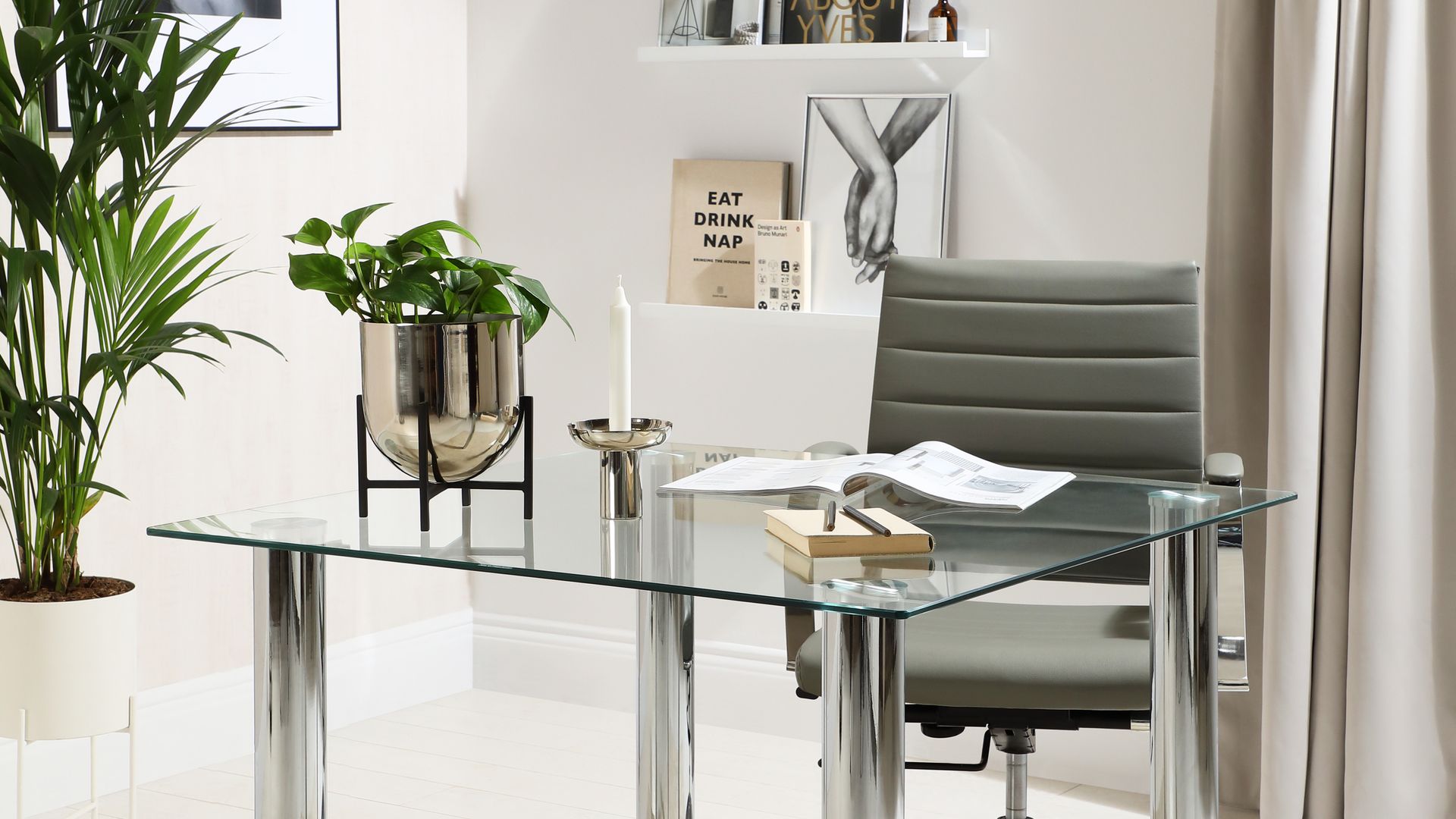 A neutral office with glass desk