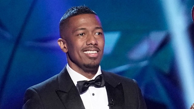 Host Nick Cannon and T-Rex in the It Never Hurts to Mask: Group C Playoffs episode of THE MASKED SINGER airing Wednesday, March 18