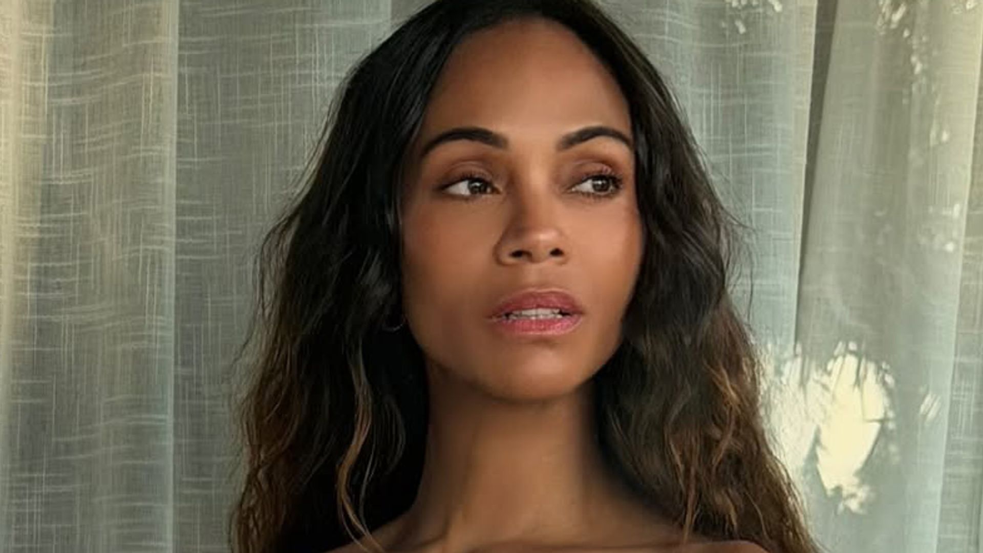 Oscar winner Zoe Saldana's hairstylist swears by this product for frizz-free hair