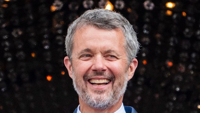 king frederik smiling in navy suit