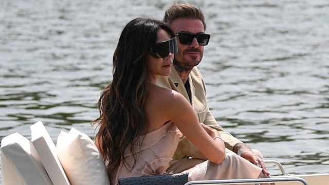 Victoria and David Beckham on a boat