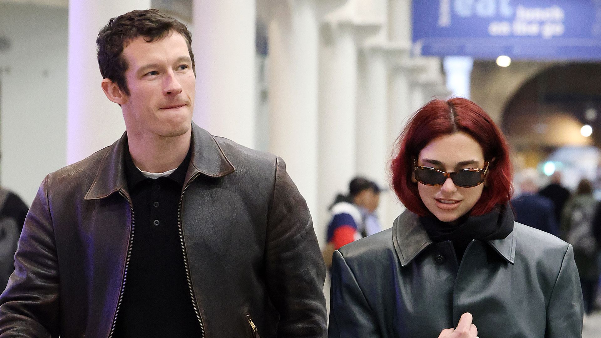 Dua Lipa and Callum Turner arriving at London St Pancras Station after taking the Eurostar from Paris on March 26, 2024 in London, England. (Photo by Neil Mockford/GC Images)