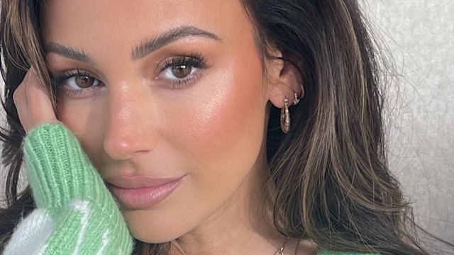 Michelle Keegan wearing a green jumper on Instagram