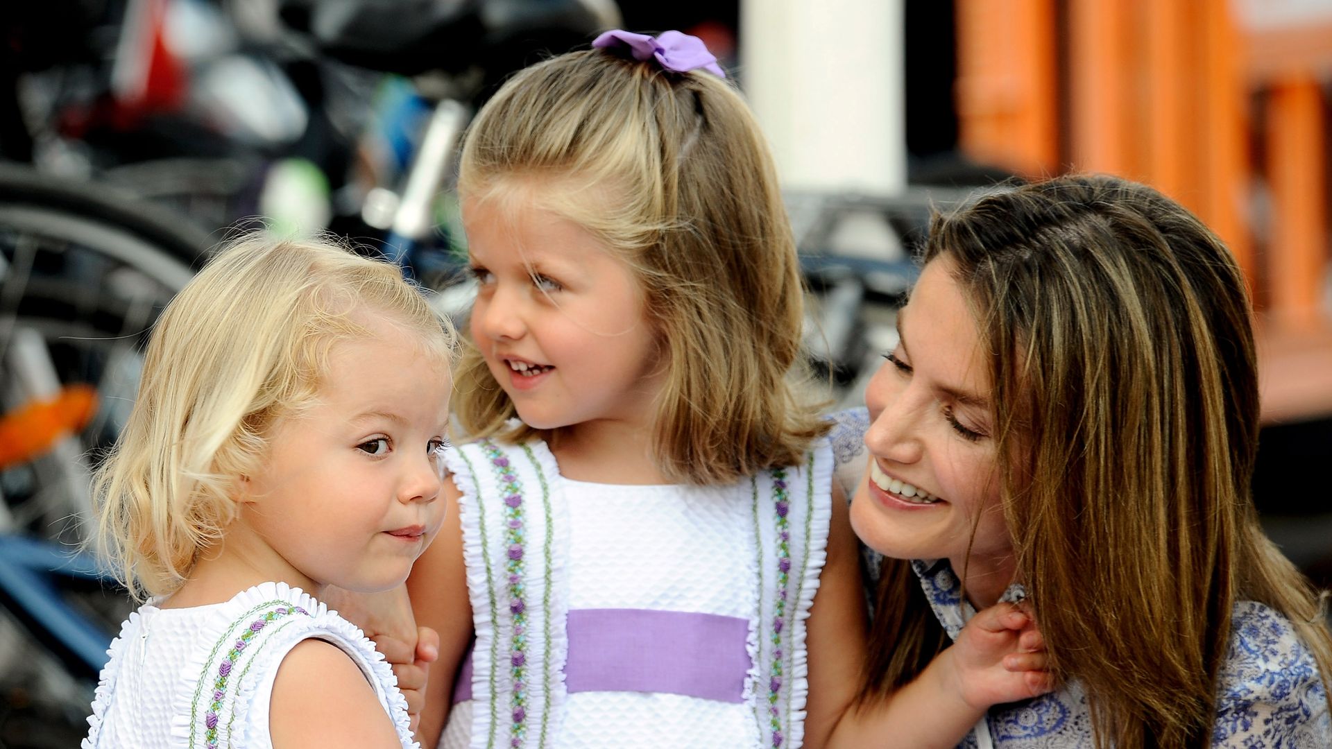 Princess Letizia of Spain and her daughters smiling