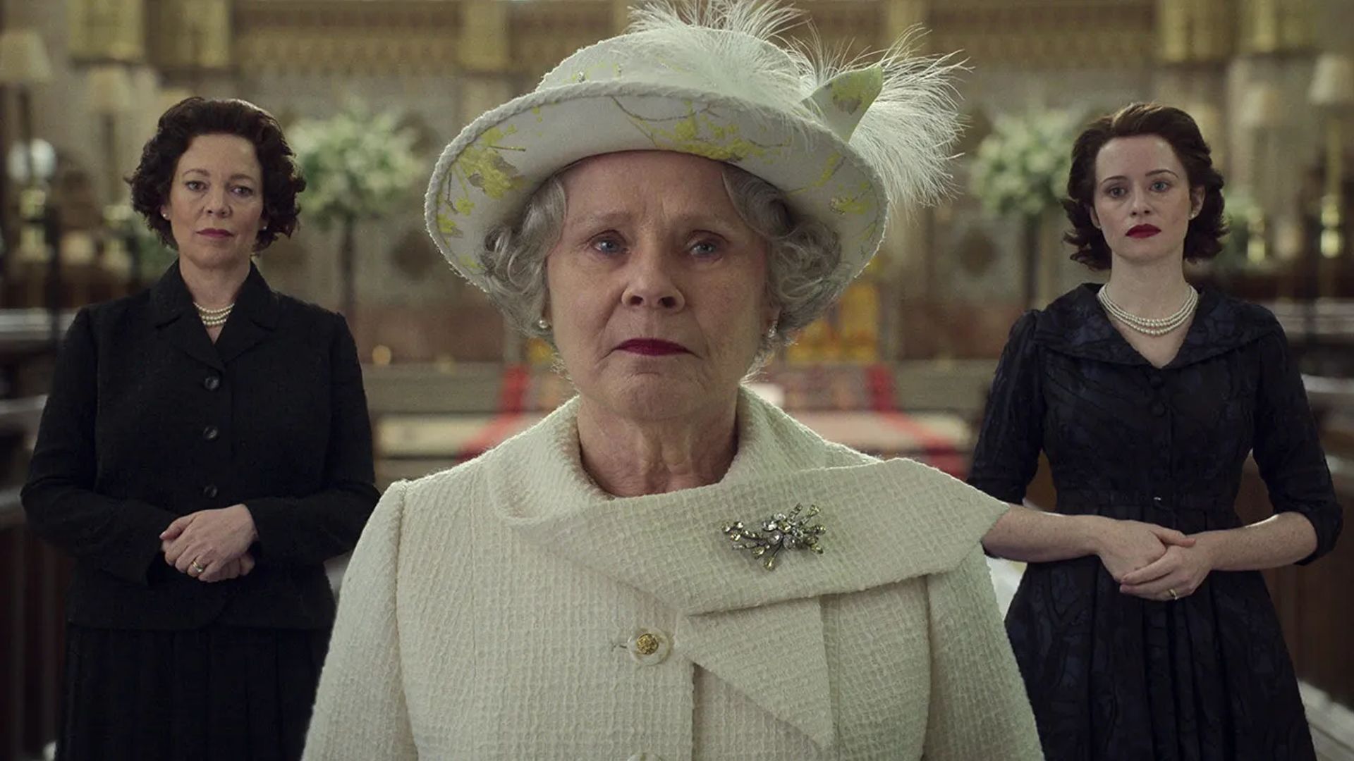 Olivia Colman, Imelda Staunton and Claire Foy stand in character as Queen Elizabeth II