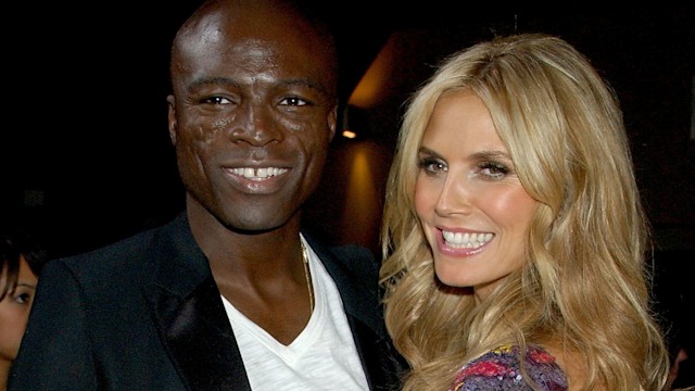 Heidi Klum and Seal posing on the red carpet 