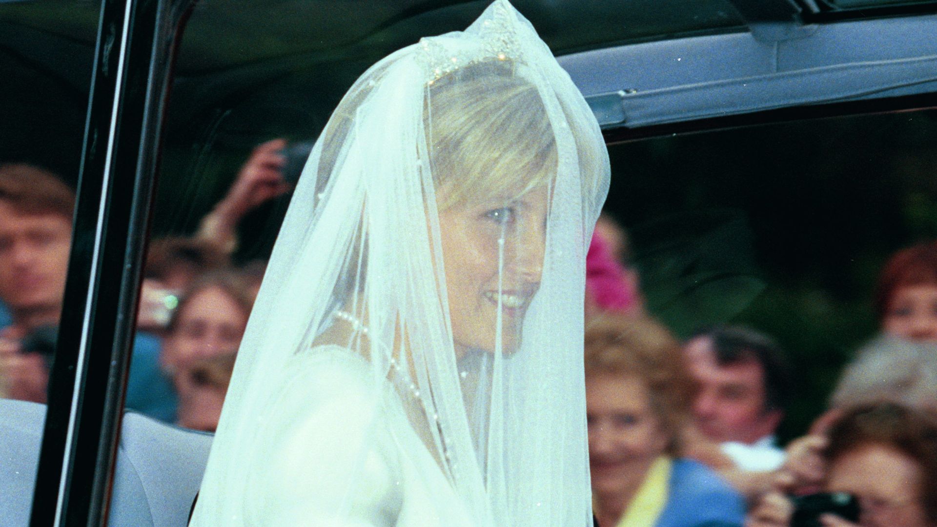 Sophie Rhys-Jones in a veil in the car on her wedding day 