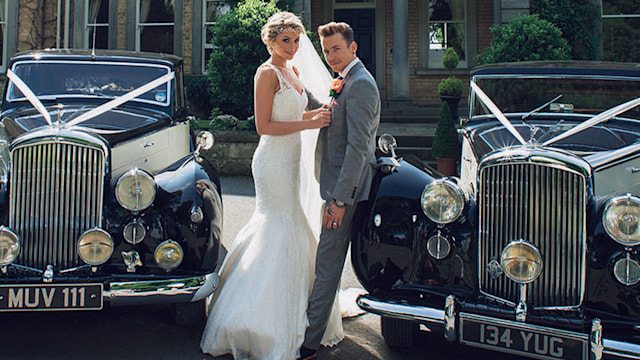 Danny Jones and bride Georgia leaning on cars on their wedding day