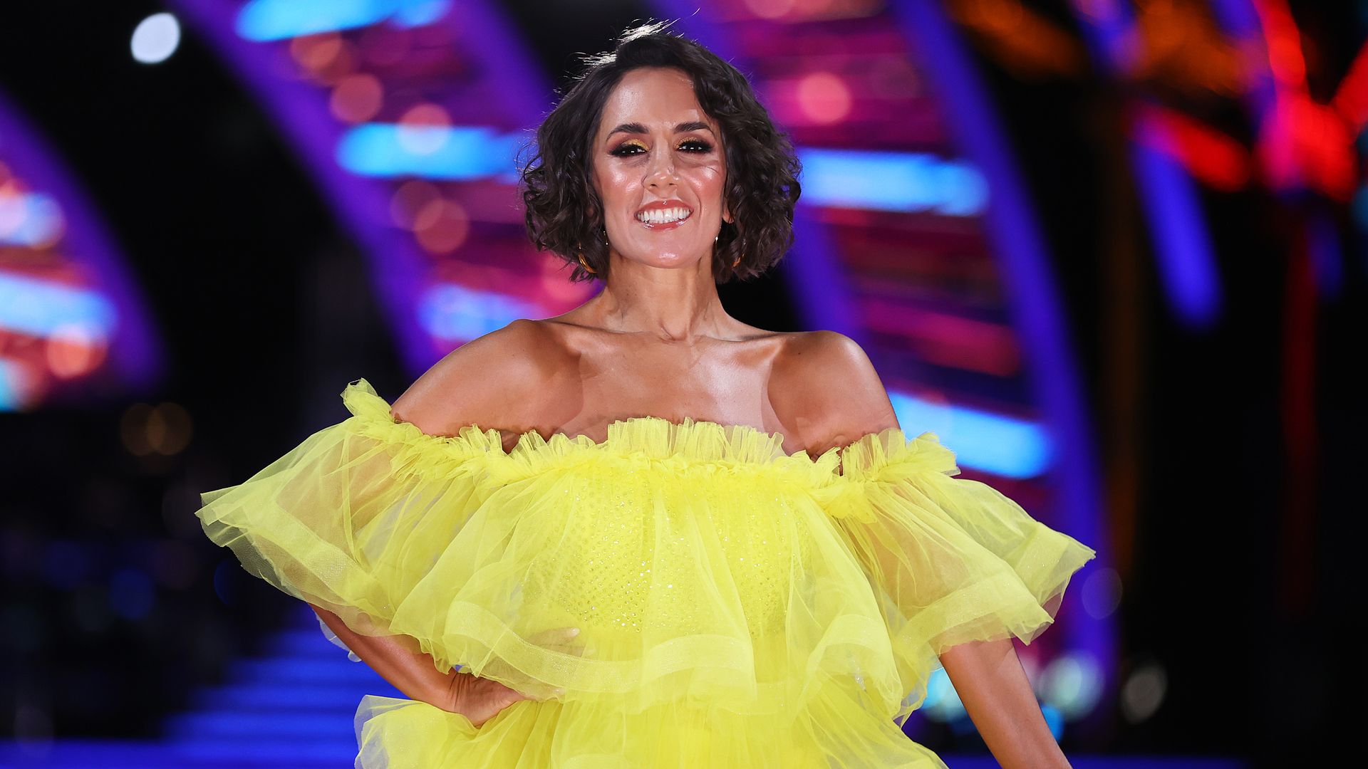 Janette Manrara in yellow dress