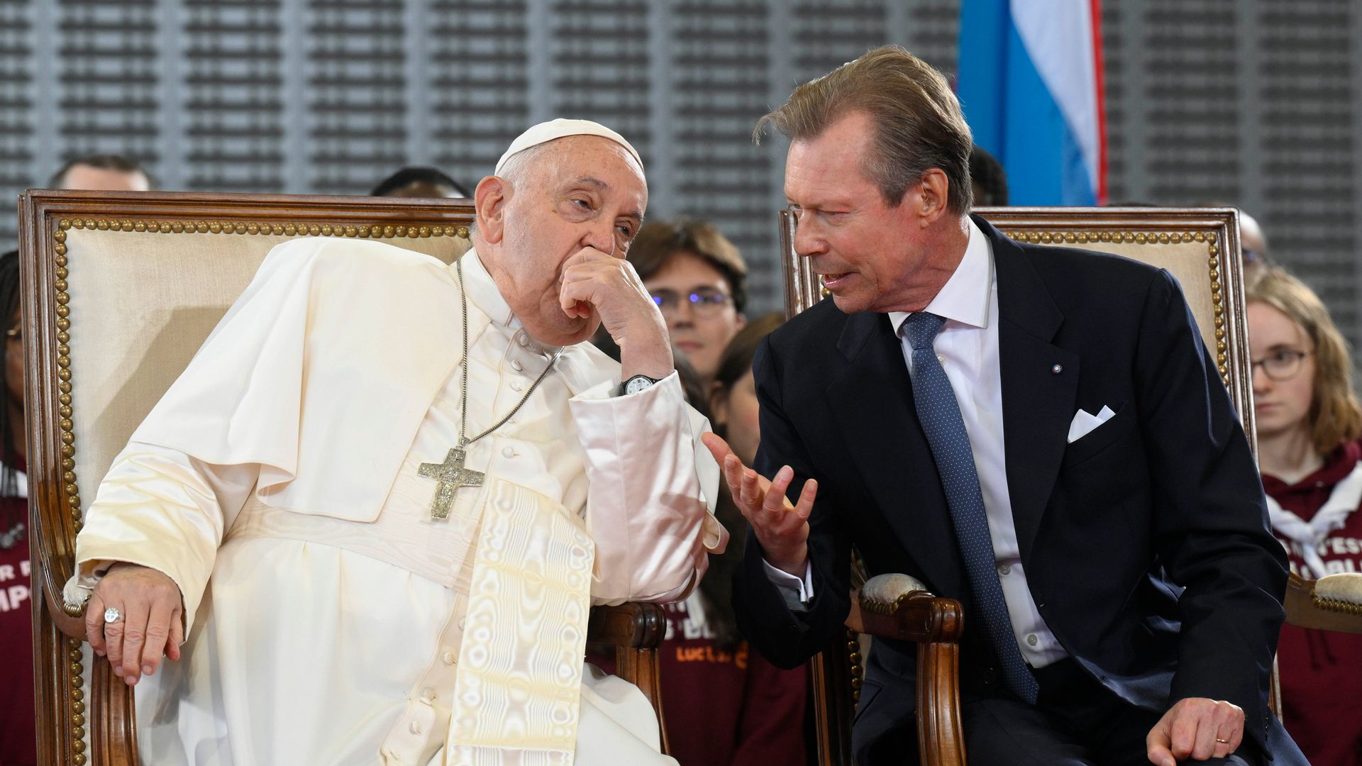 Pope Francis leaning in to listen to Grand Duke Henri
