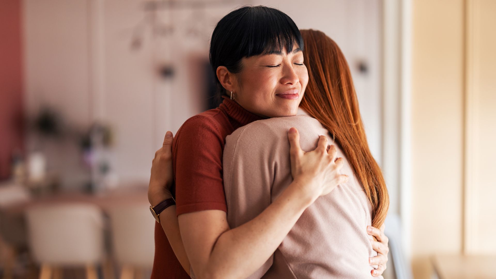 woman hugging being kind