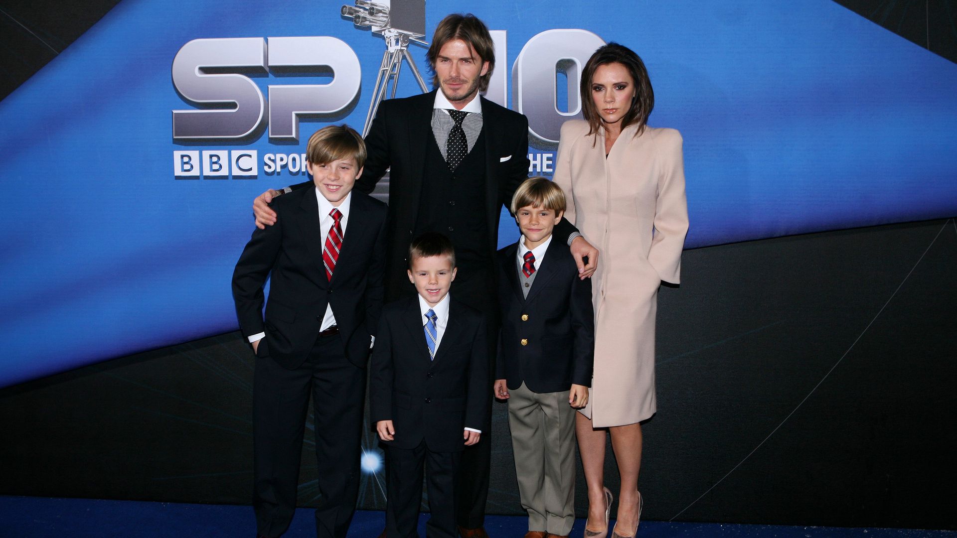 David and Victoria Beckham with sons Brooklyn, Cruz and Romeo in 2010