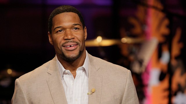 Michael Strahan smiles gap teeth