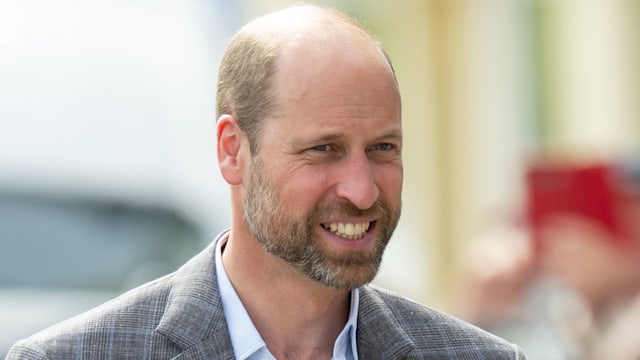 Prince William in checked blazer and blue shirt