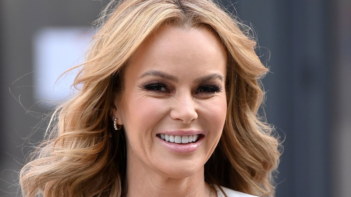 Amanda Holden stuns in mini dress alongside her lookalike daughters on Greek getaway