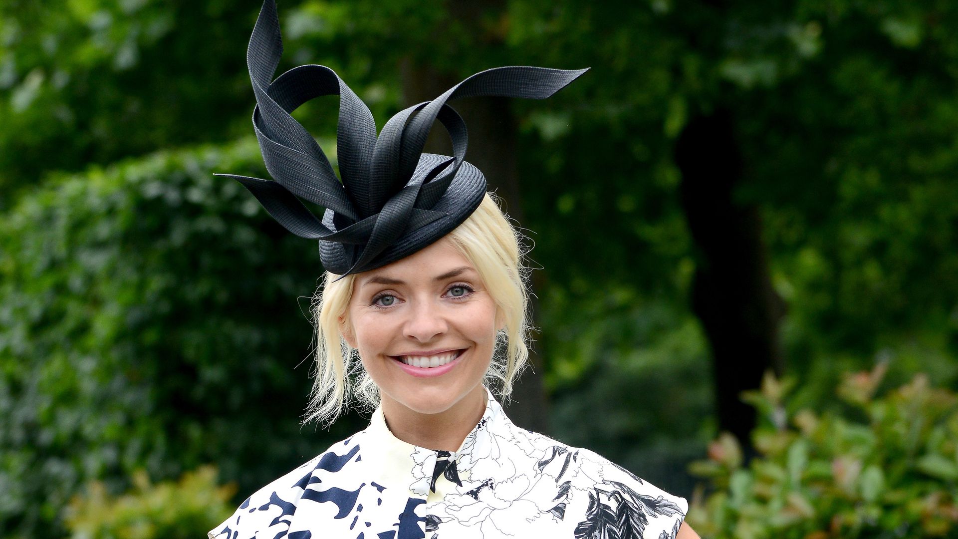Holly Willoughby at Royal Ascot wearing floral dress and hat