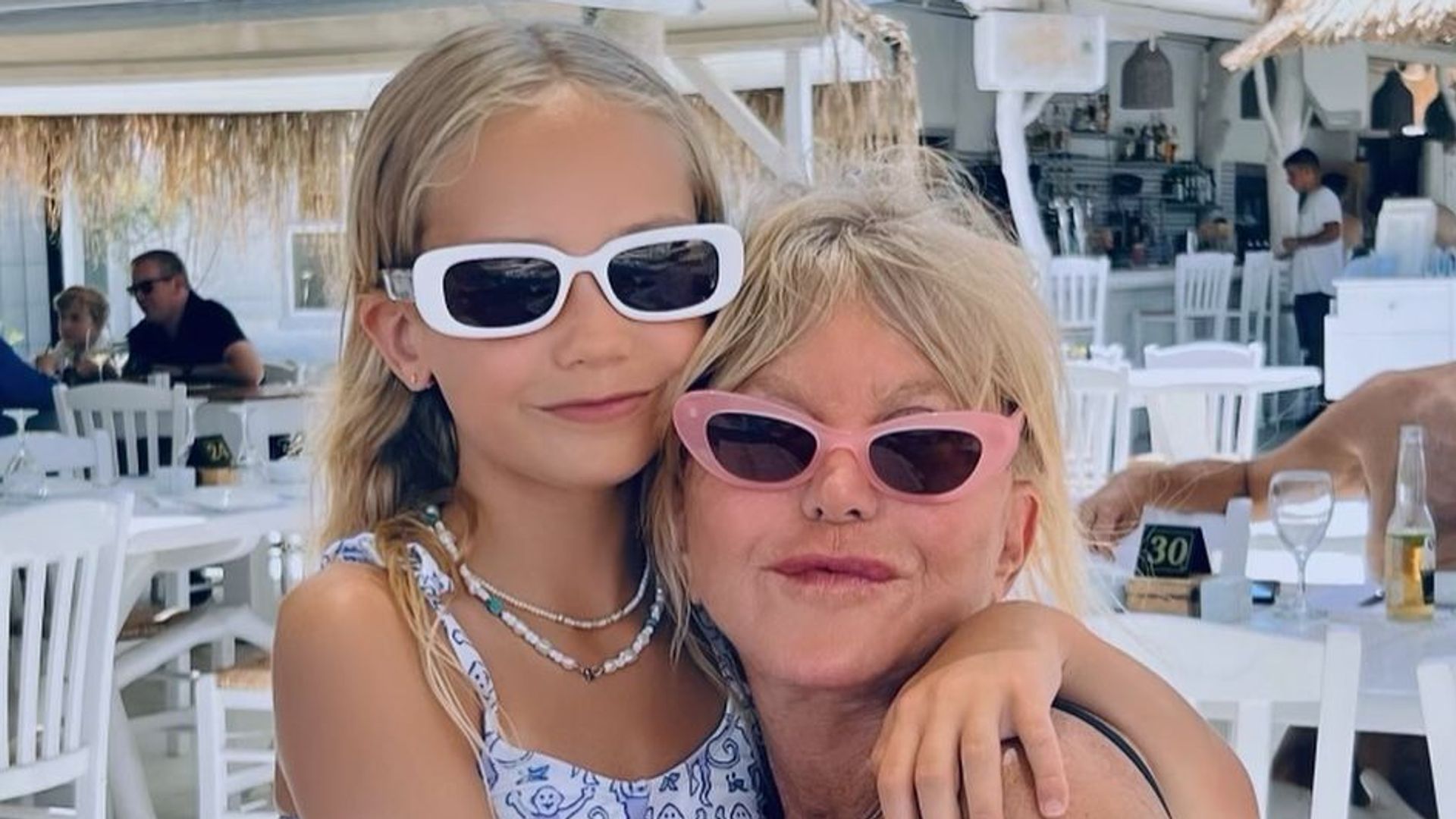 Goldie Hawn dotes on her lookalike granddaughters during 'perfect' family day out