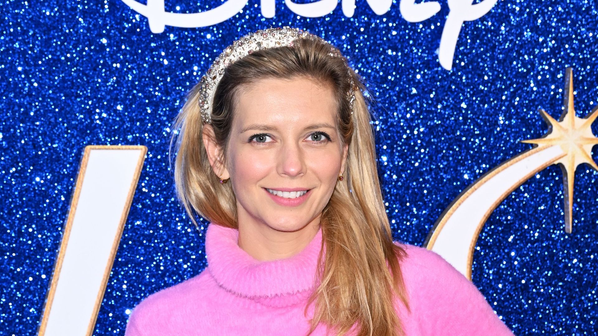 Rachel Riley in a pink jumper on the red carpet
