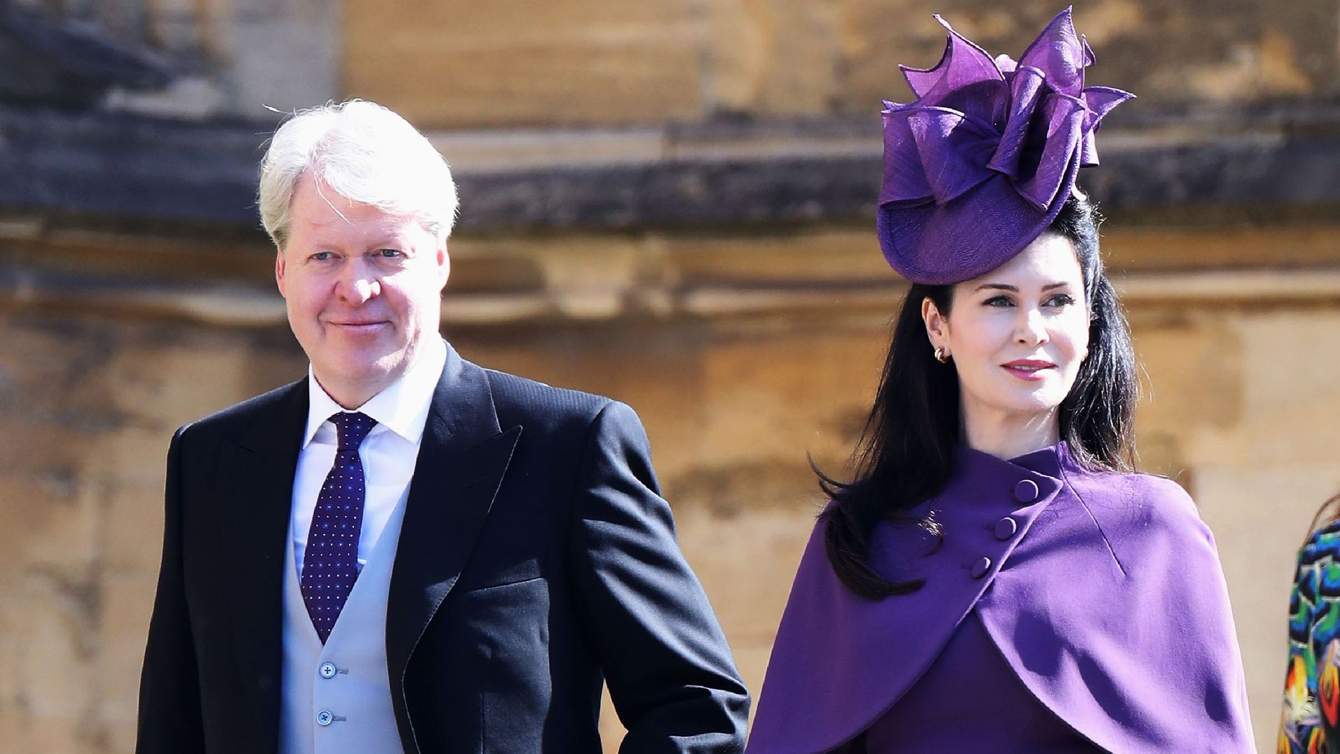 Charles Spencer, 9th Earl Spencer (L) and his wife, Karen Spencer arrive for the wedding ceremony of Britain's Prince Harry, Duke of Sussex and US actress Meghan Markle 