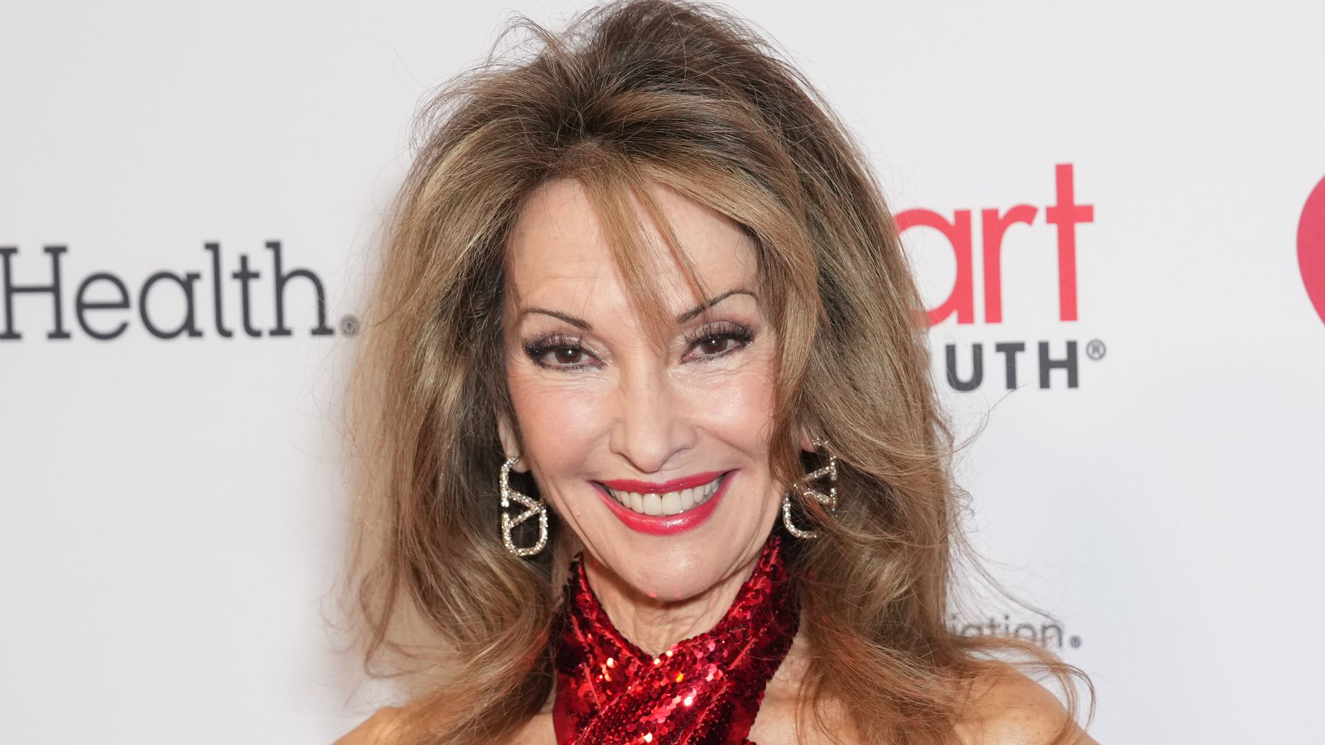 Susan Lucci’s pilates-perfected physique is a scene stealer in dazzling gown