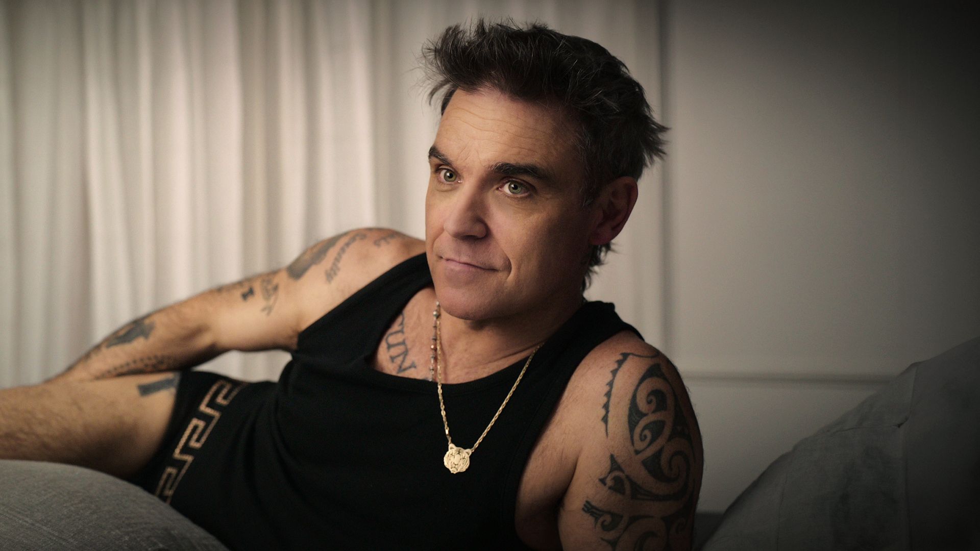 Robbie Williams tells all about his life and career in a new Netflix documentary 