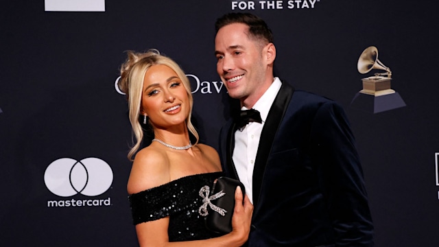 US socialite Paris Hilton (L) and husband US author Carter Reum arrive for the Recording Academy and Clive Davis pre-Grammy gala at the Beverly Hilton hotel in Beverly Hills, California on February 4, 2023