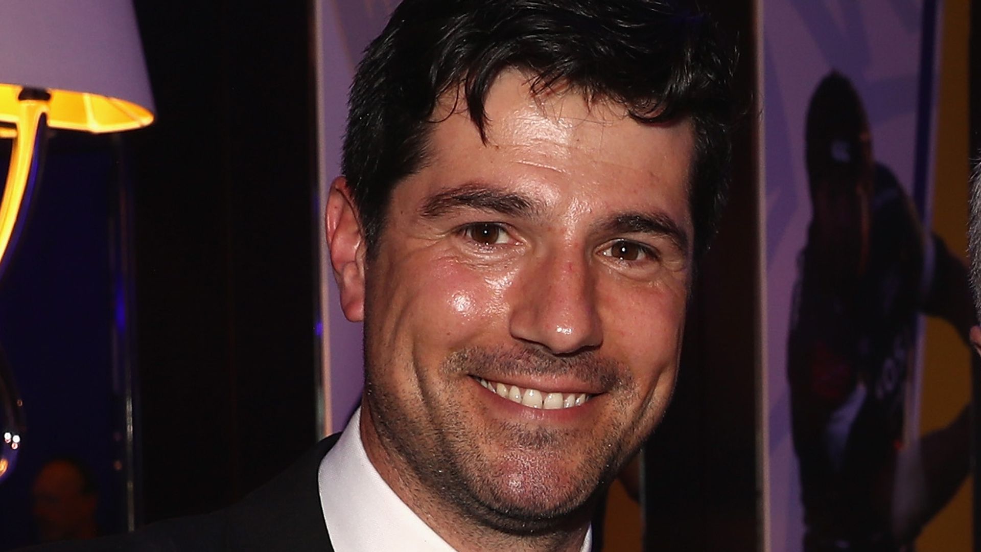 Craig Doyle in a suit and bow tie