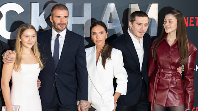 Harper Beckham, David Beckham, Victoria Beckham, Brooklyn Beckham and Nicola Peltz on red carpet