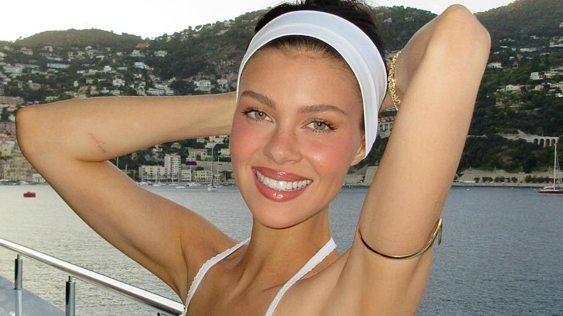 Nicola Peltz poses in striking strapless bikini following teeth transformation