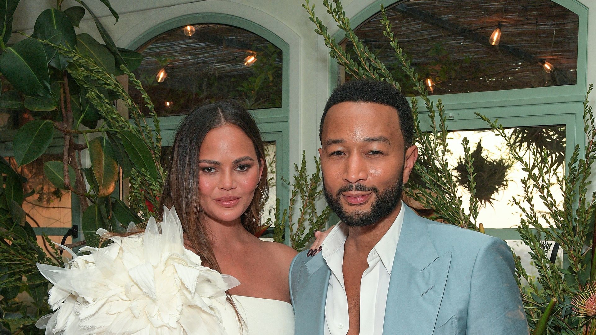 Chrissy Teigen and John Legend attend the Itâs Good âFrom the Source" Dinner hosted by John Legend & Mike Rosenthal featuring speciality Tequila Don Julio cocktails on July 10th in Los Angeles, California.