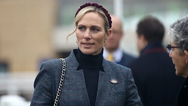 Zara Tindall wearing a blue jacket at Cheltenham Racecourse Christmas Meeting