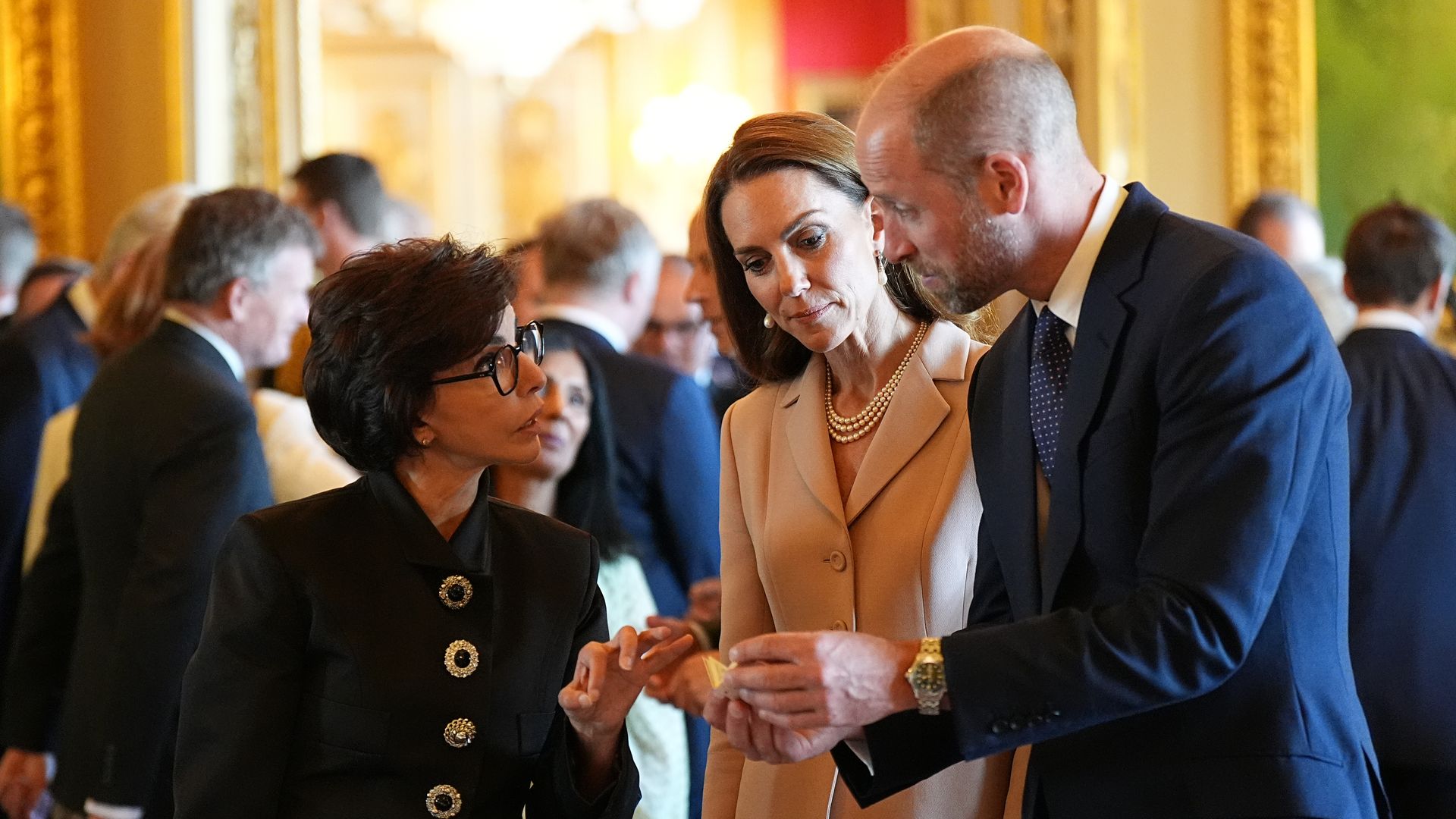 Prince William and Kate Middleton viewing items in royal collection