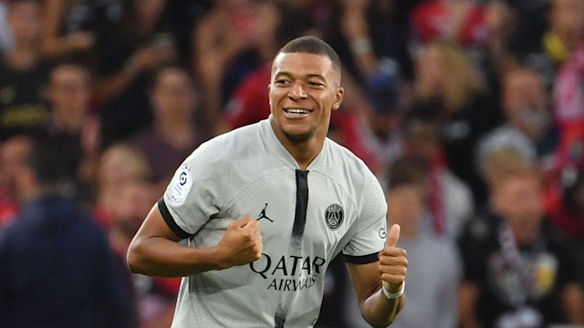 Paris Saint-Germain's French forward Kylian Mbappe celebrates scoring his team's first goal during the French L1 football match between Lille OSC and Paris-Saint Germain (PSG) at Stade Pierre-Mauroy in Villeneuve-d'Asq, northern France on August 21, 2022. 