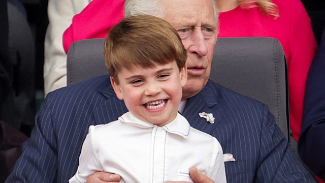 A sweet moment between grandpa and grandson at the Platinum Jubilee