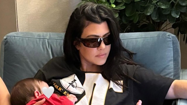 Kourtney Kardashian holding baby son Rocky 